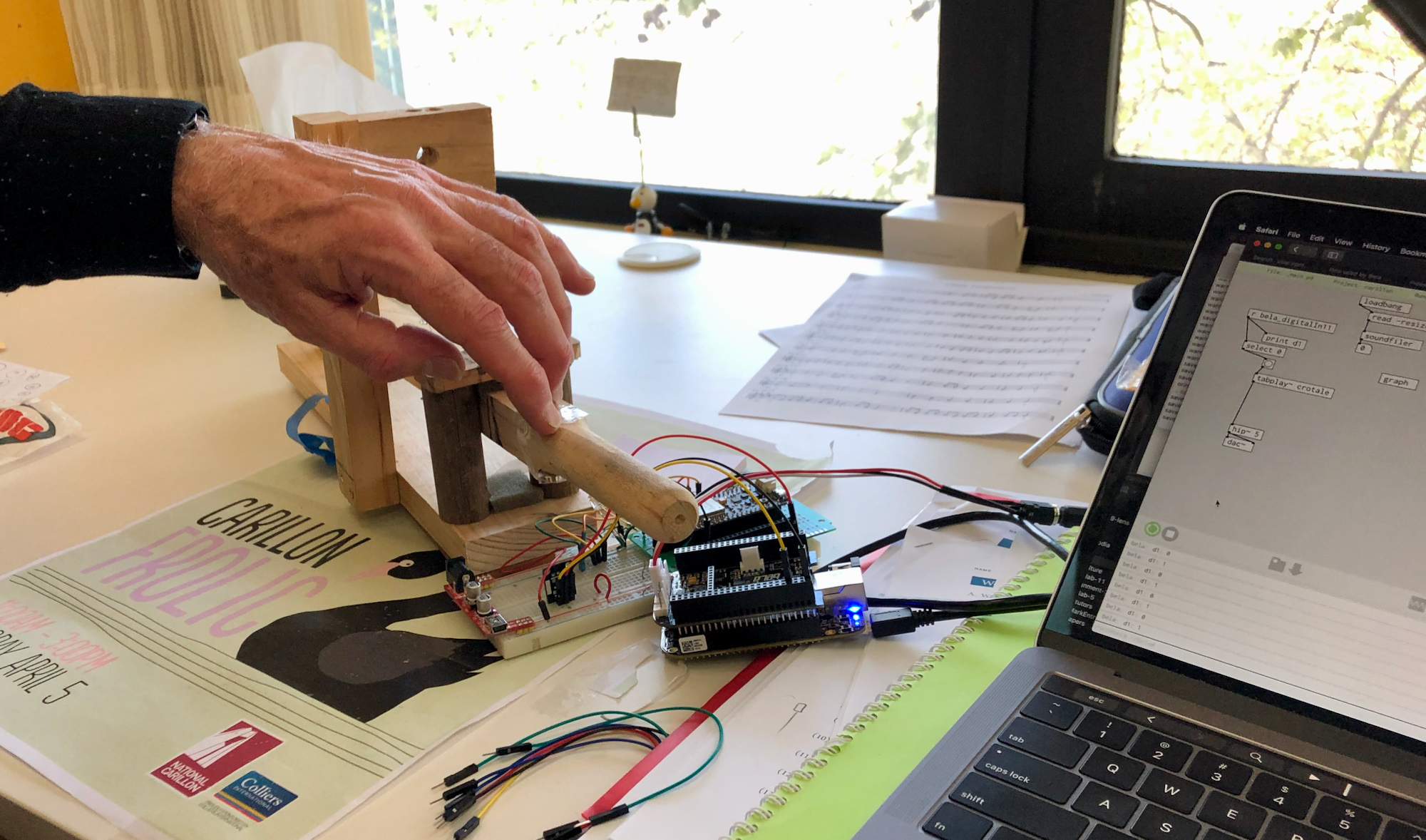 A test rig with one carillon baton and the Bela