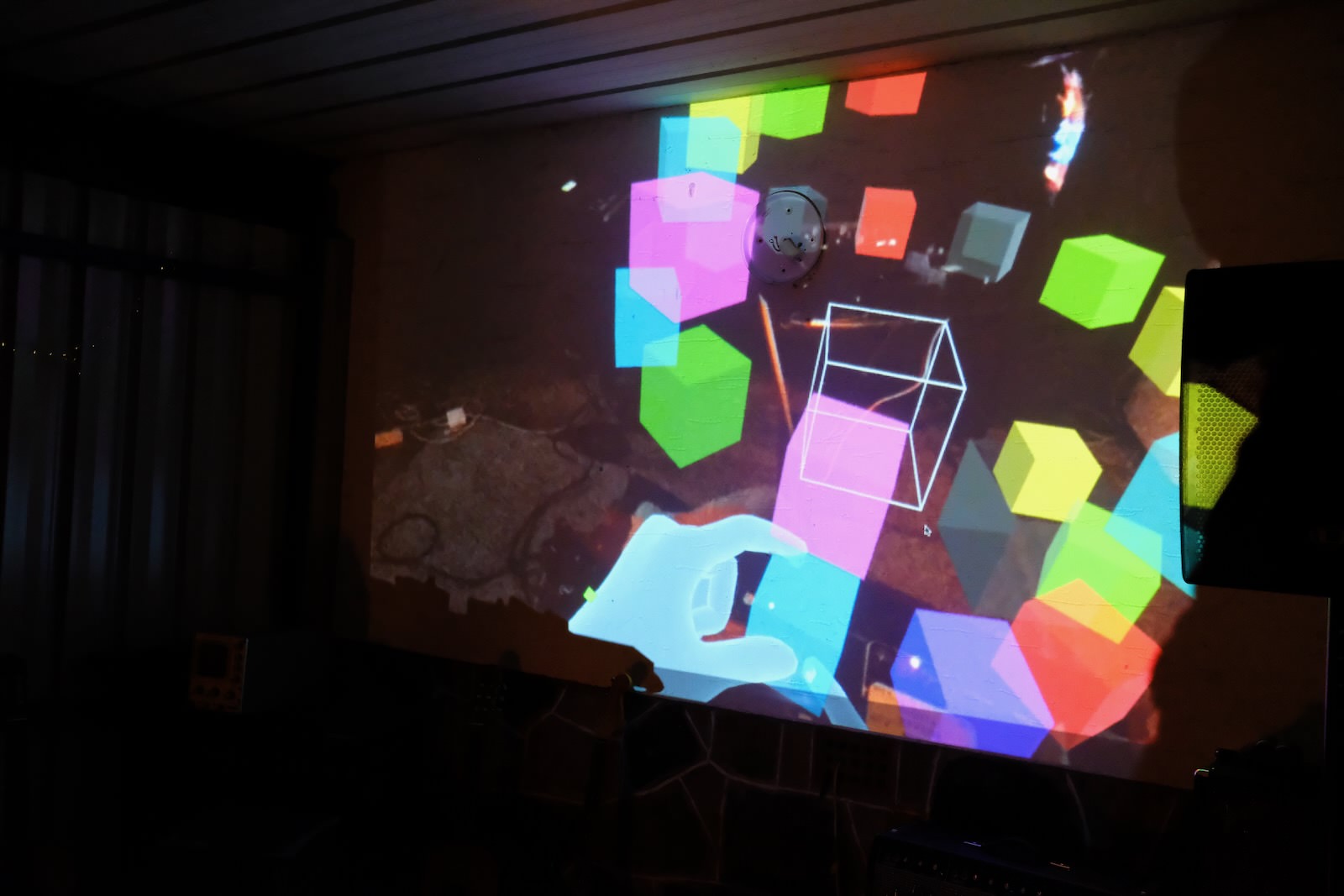 The cubes projected on the garage wall.