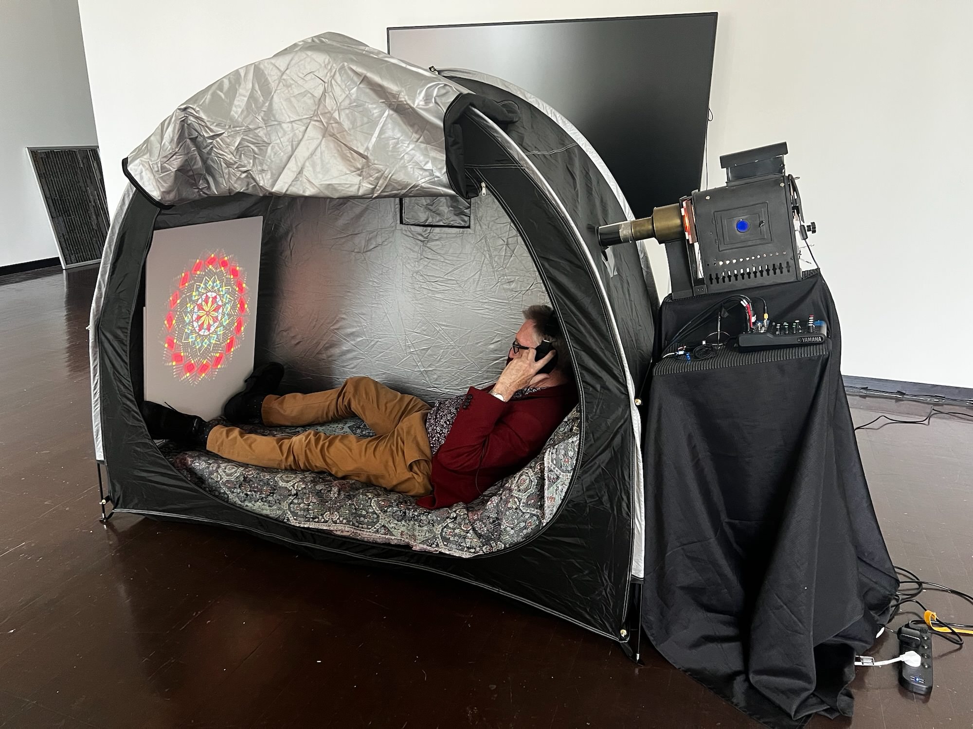 Martyn Jolly demonstrating use of the Dream Tent but without the tent fully zipped up.