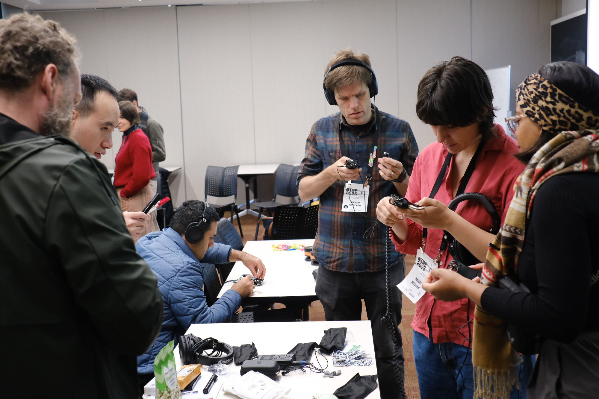 Workshop attendees doing some listening in the Hanna Neumann building.