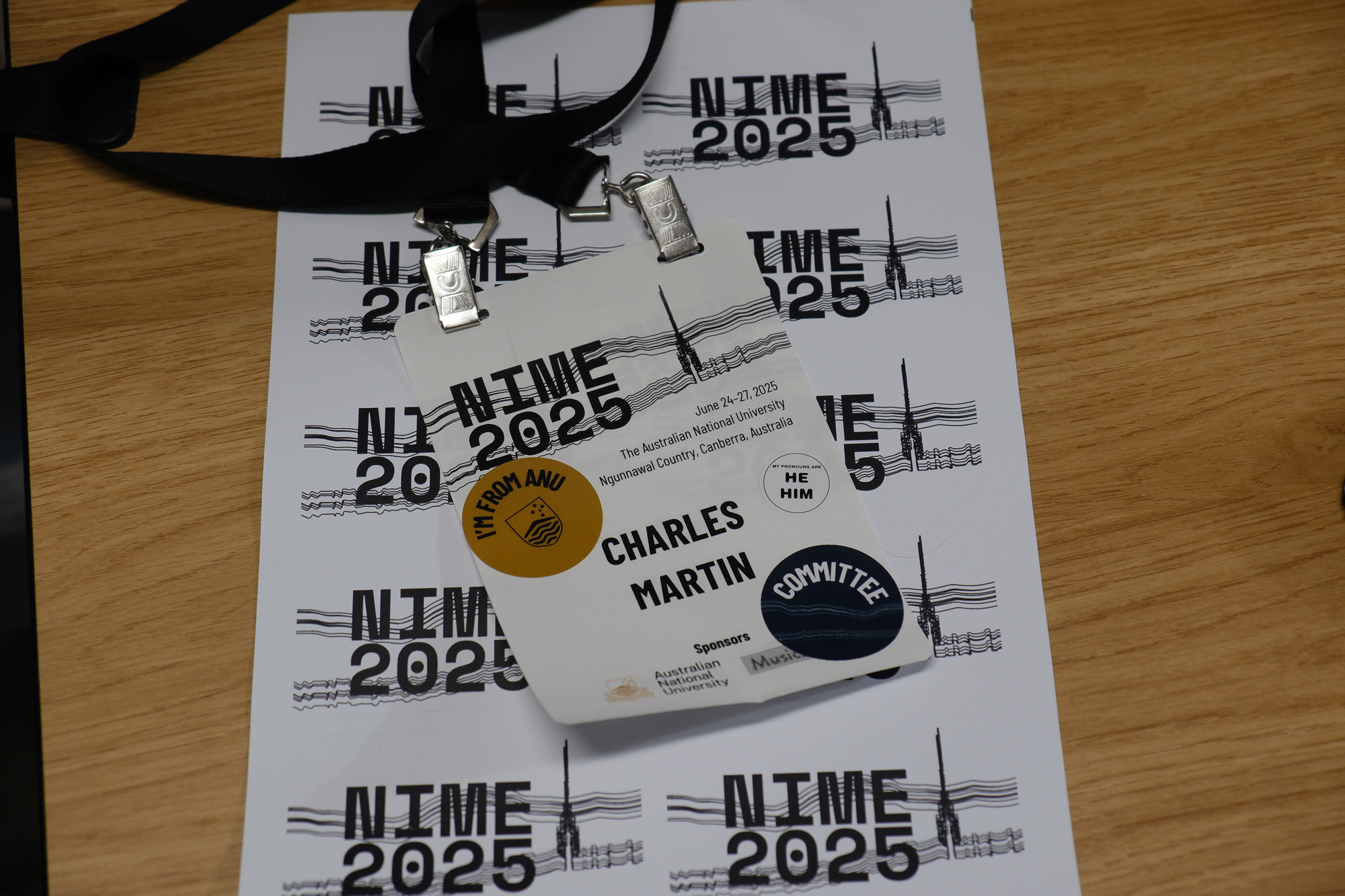 Badges and stickers make the conference real!