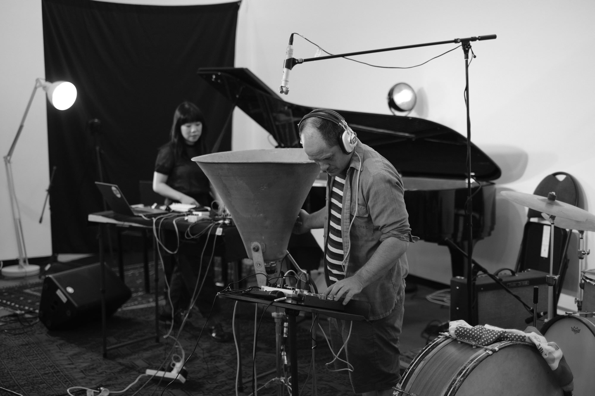 Yichen Wang and Jesse Twomey setting up for performance.