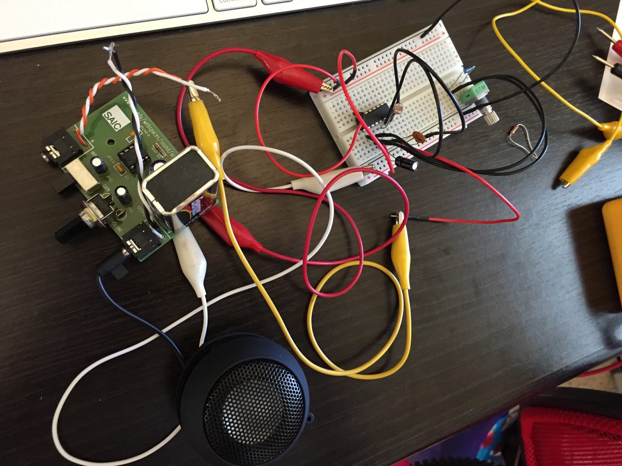 Building a small synth circuit on a breadboard.